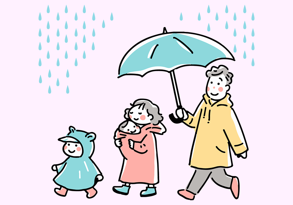 雨の中散歩する家族