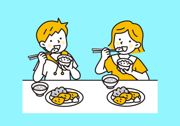 食事をする男女